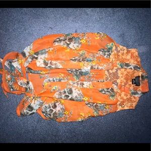 Orange skull laced sleeveless button down